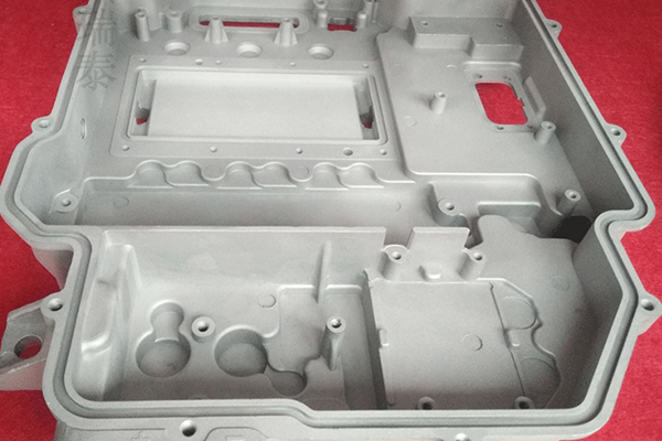 Magnesium die cast camera body from Canon.